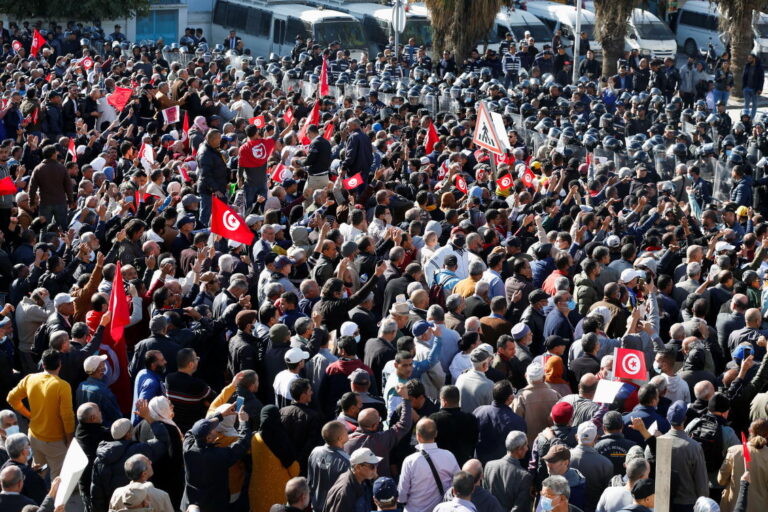 Tunisian protesters try to march on suspended parliament