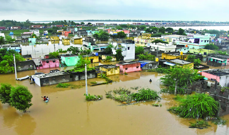 Dozens of people dead or missing as flash floods hit southern India