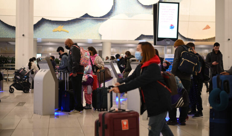 WHO warns against blanket travel bans over Omicron coronavirus variant