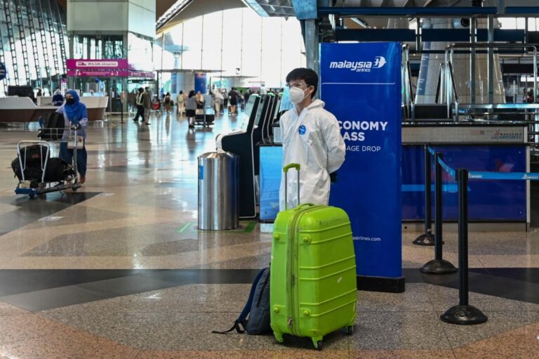 Malaysia bans travelers from countries deemed at risk from omicron