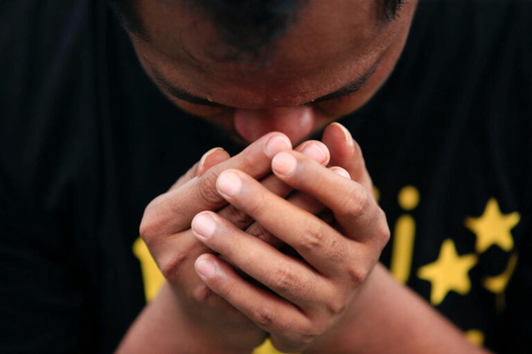 Indonesian Muslims hold Friday prayers in shadow of deadly volcano
