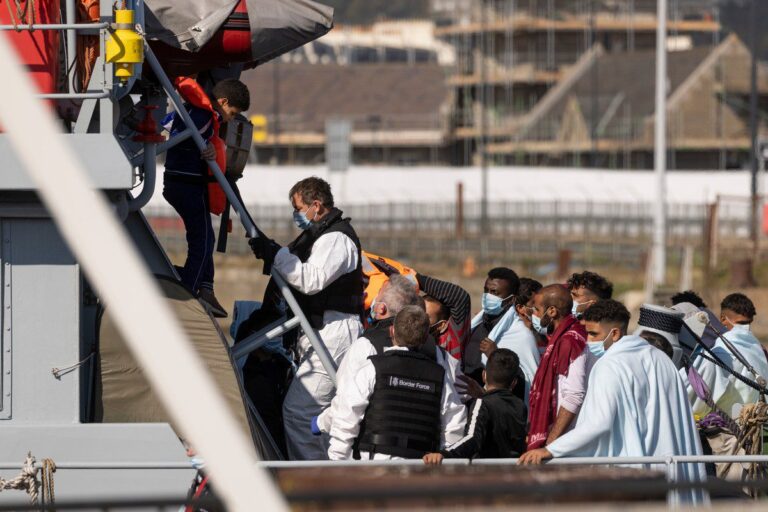UK court overturns convictions of Iranians accused of people smuggling