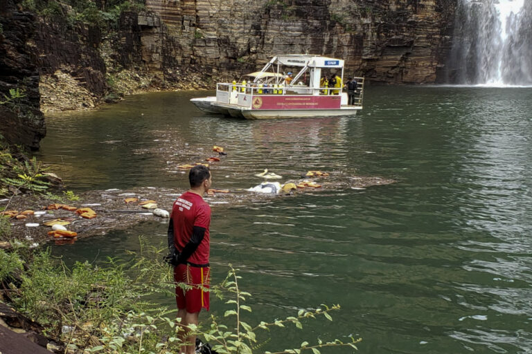 Seven killed in Brazil after cliff collapses onto boats in lake