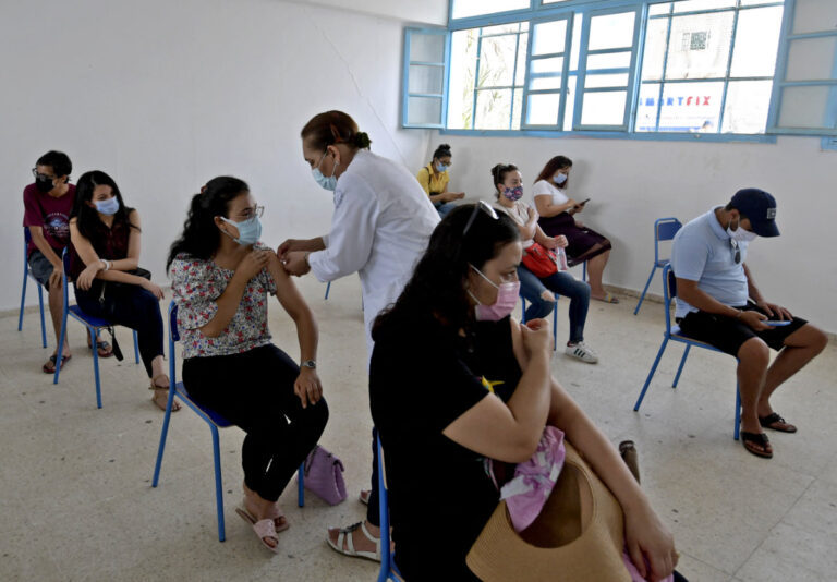 Will 2022 bring COVID-19 herd immunity or more lockdowns and travel bans?