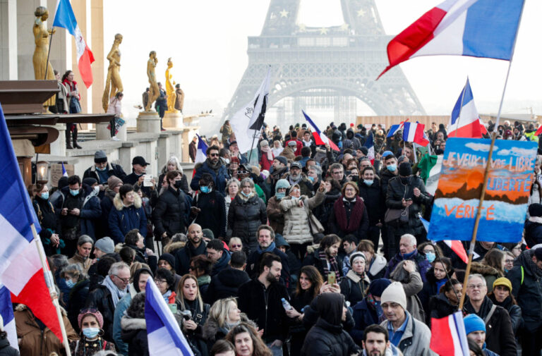 Protesters hit French streets to fight new vaccine pass