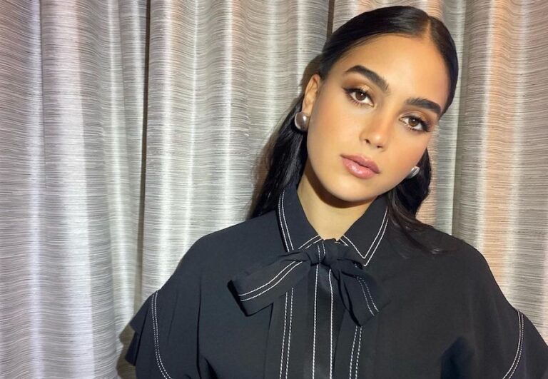 Actress Melissa Barrera talks ‘Scream 5’ wearing a statement jumpsuit by Elie Saab