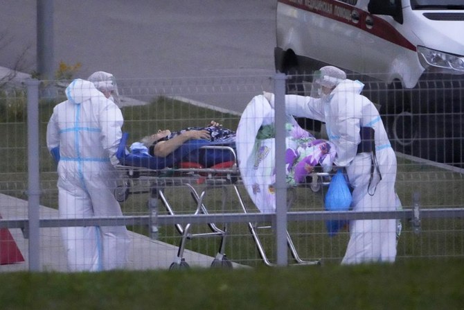 Russia’s daily COVID-19 infections near 200,000 for 1st time