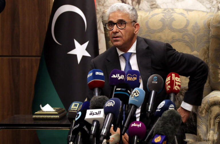 Libyan PM promises new election law to solve political crisis