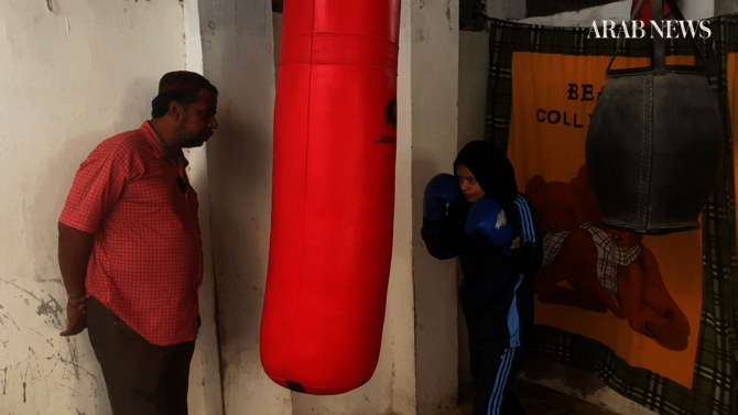 Pakistani father from Karachi neighborhood helps boxer daughters punch through gender barriers