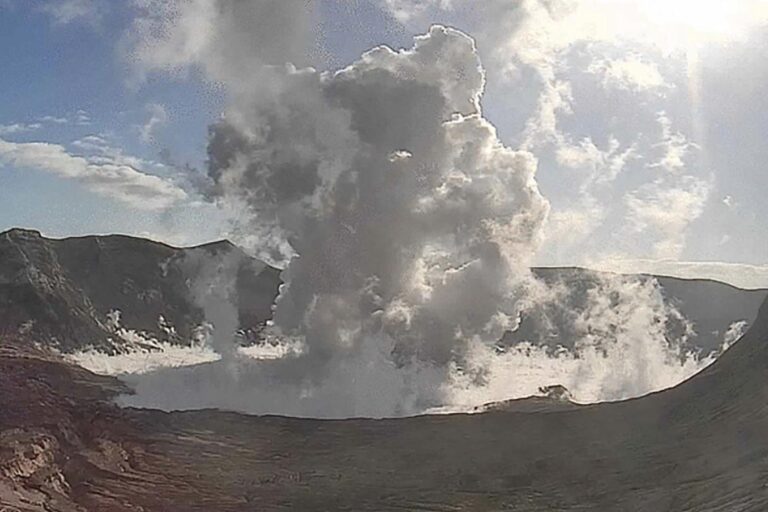 Philippine volcano spews ash and steam, evacuation underway