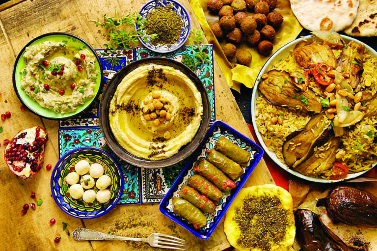 Palestinians enjoy popular regional dishes during Ramadan