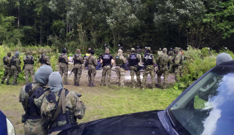 Middle Eastern refugees report violent treatment by Polish authorities
