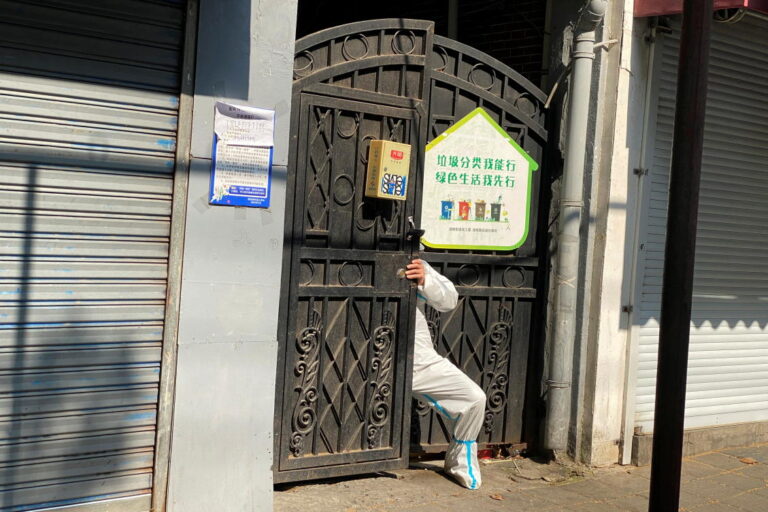 Shanghai people ‘not free to fly’ out of homes as COVID-19 cases tick back up