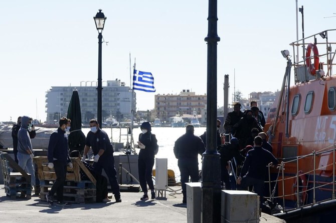 Greek police rescue 64 migrants marooned on border islet