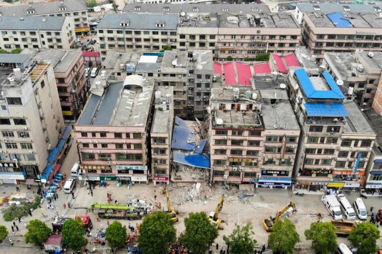 Five rescued from China building collapse