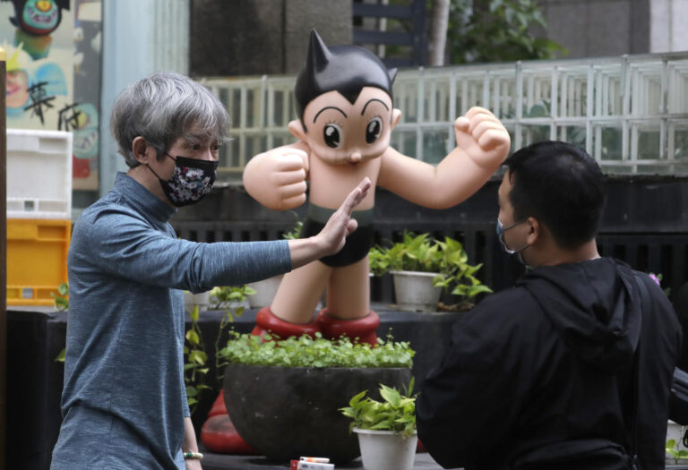 Taiwan cuts COVID-19 quarantine for arrivals even as cases rise