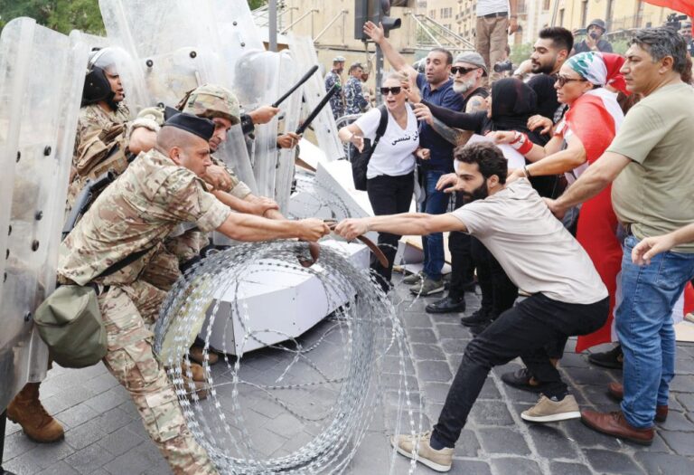 Lebanon’s banks confront politicians in protest against lawsuits and arrests