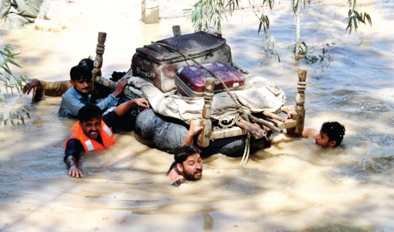 Pakistan braces for more rain as flood deaths top 1,000