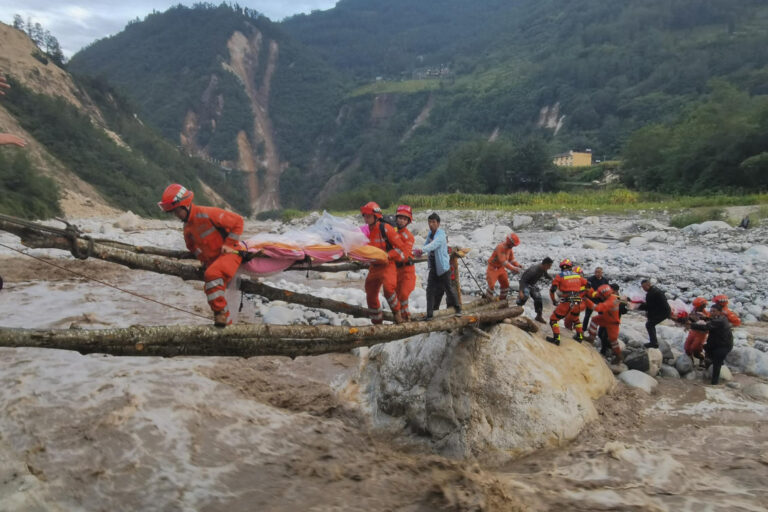 Downpours and mudslides hamper China earthquake rescue mission