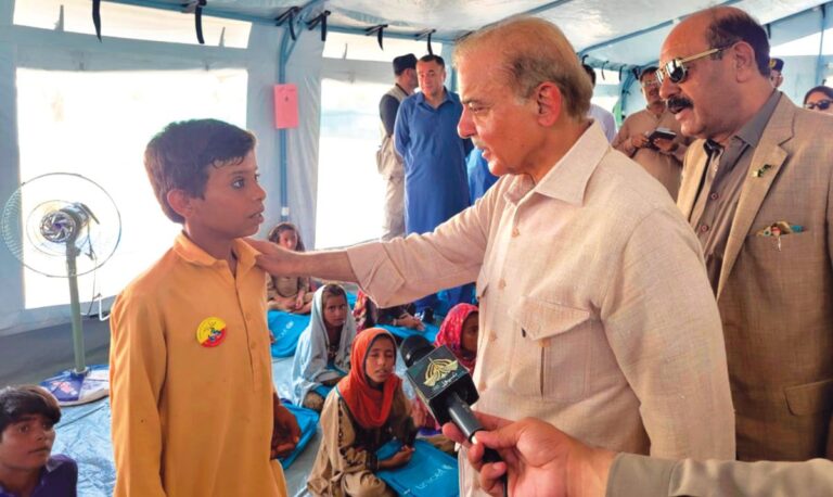 Pakistani premier promises compensation for flood victims
