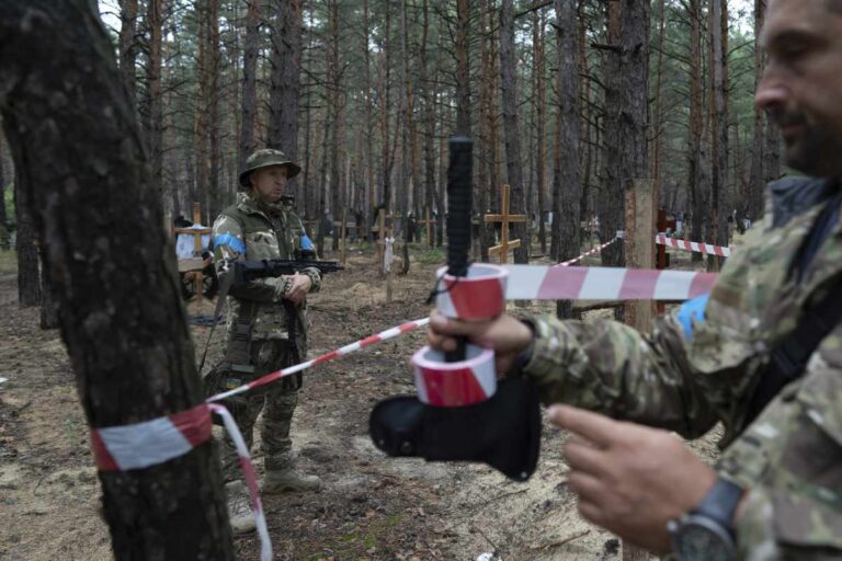 Ukraine says mass grave found in Izium where Russians were ousted days ago