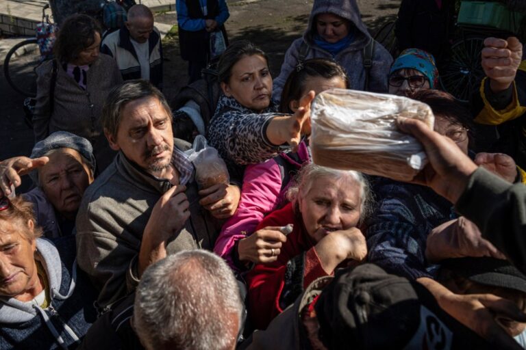 War leaves Ukraine farming village queueing for food