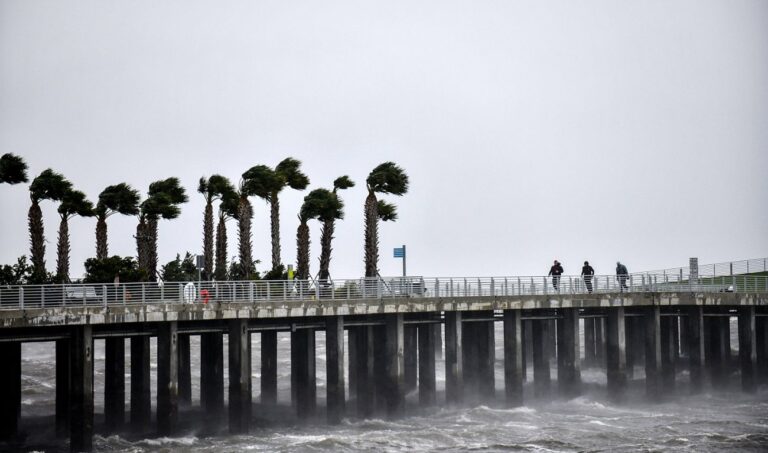 Hurricane Ian swamps southwest Florida, trapping people in homes