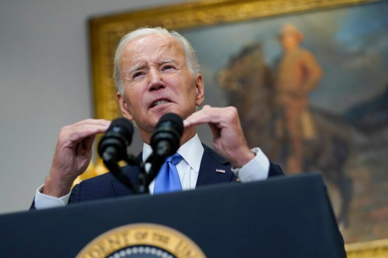 Biden signs bill to avert US government shutdown, aid Ukraine