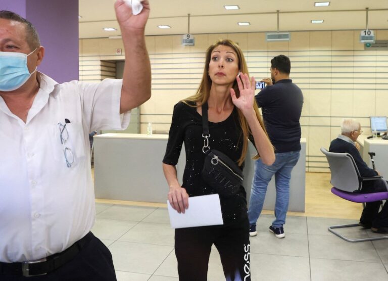 Lebanese MP Cynthia Zarazir enters Byblos Bank north of Beirut to demand frozen savings