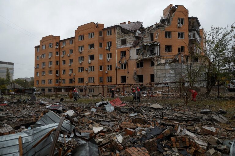 Russia strikes homes in south Ukraine, warns of escalation